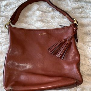 Chestnut Coach over the should bag!